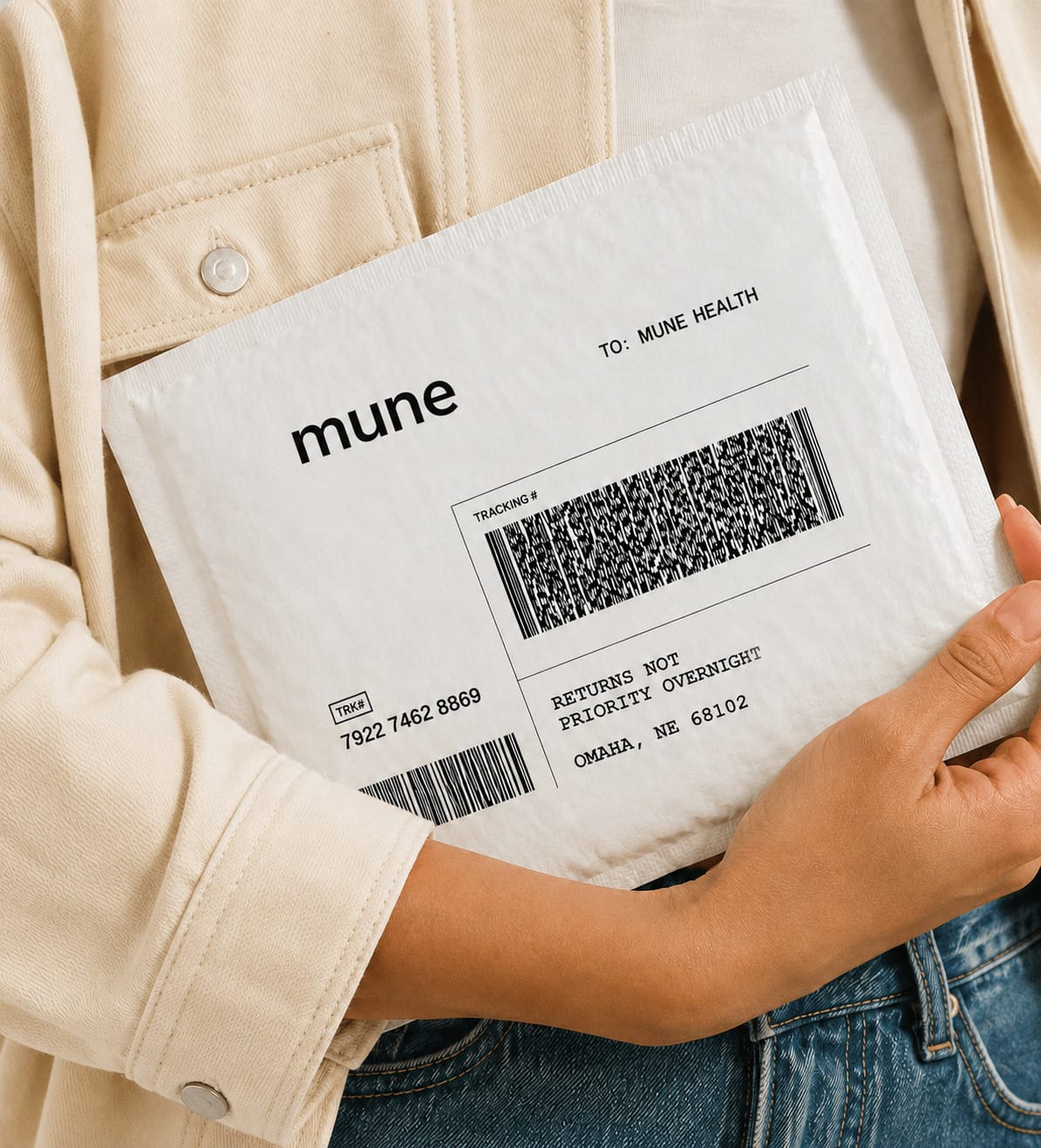 A person holding the prepaid Mune return mailer